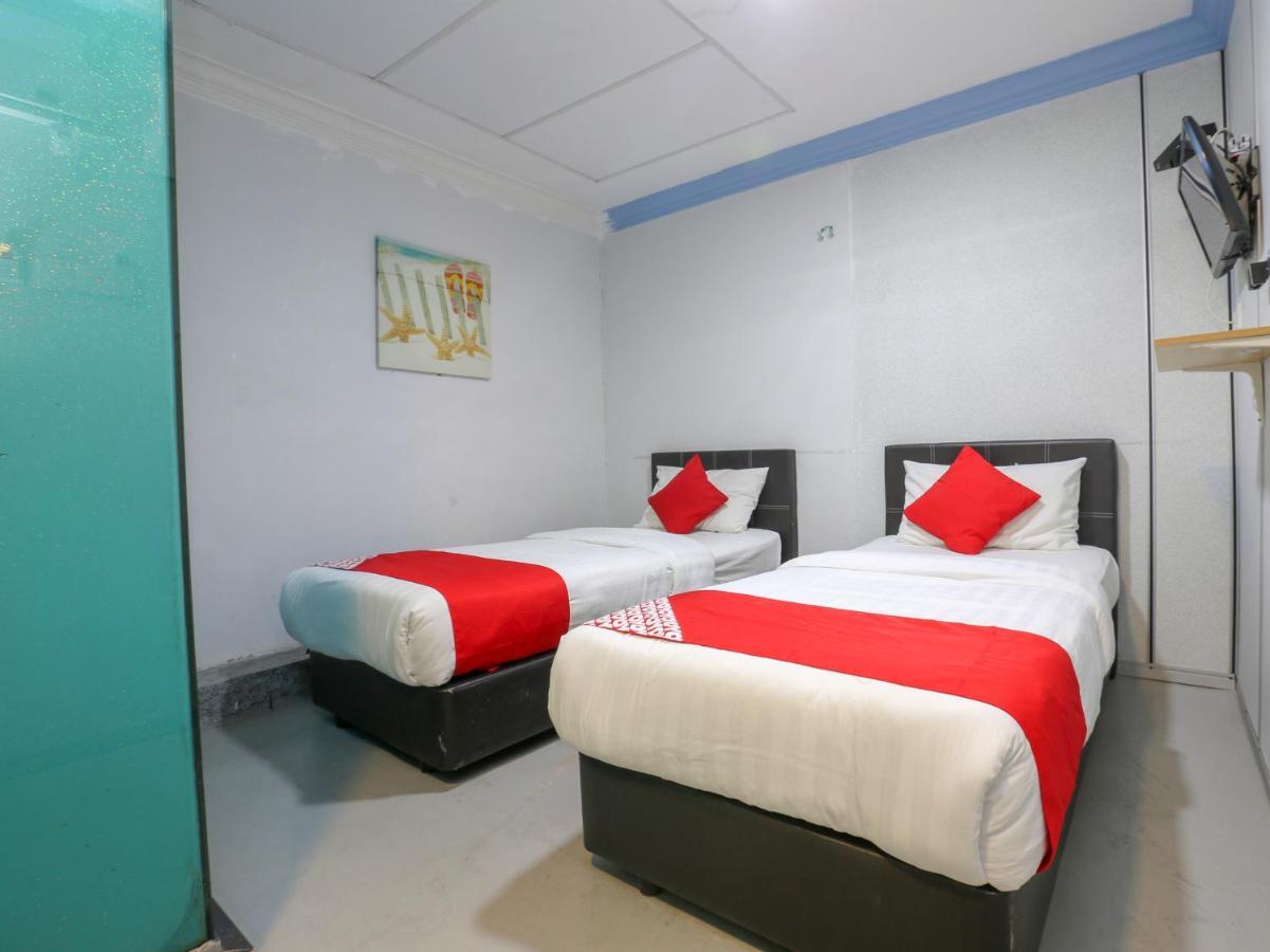 Oyo 90126 Pen U Cottages Dungun Bagian luar foto