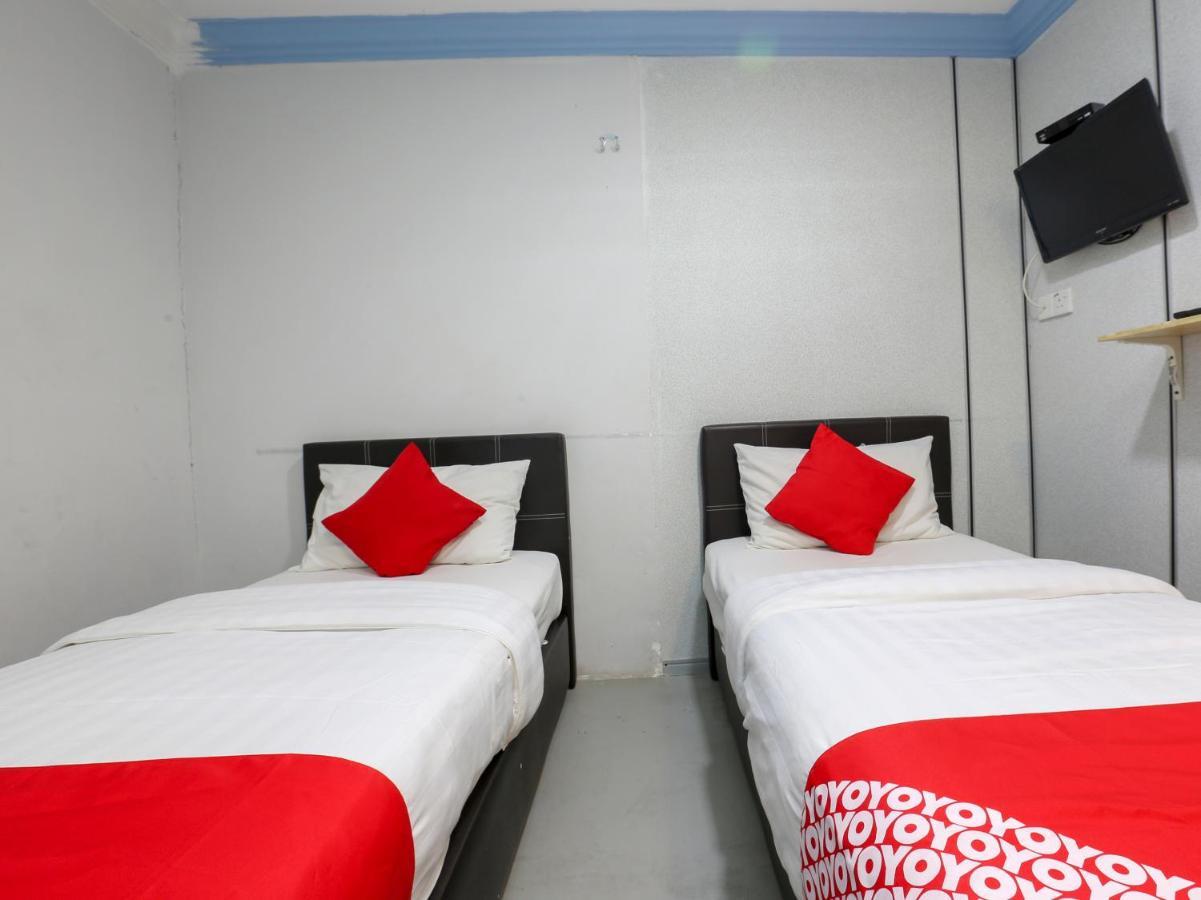 Oyo 90126 Pen U Cottages Dungun Bagian luar foto