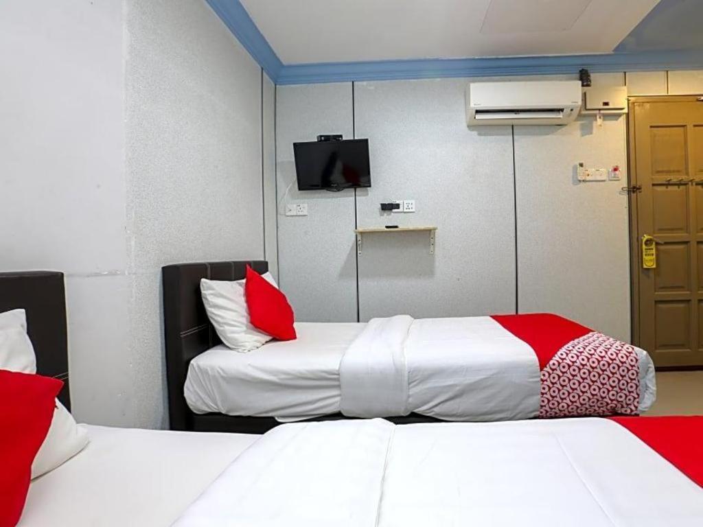 Oyo 90126 Pen U Cottages Dungun Bagian luar foto
