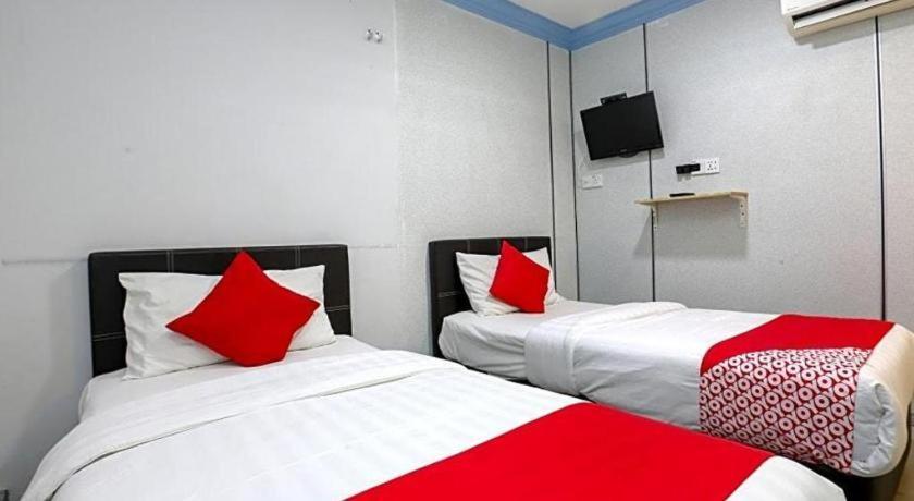 Oyo 90126 Pen U Cottages Dungun Bagian luar foto